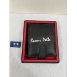 A Buono Pelle black leather wallet. As new and boxed