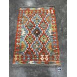 A Choli Kilim rug. 1.2m x 0.8m