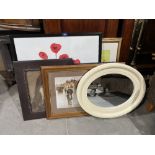 A quantity of framed pictures with an oval mirror