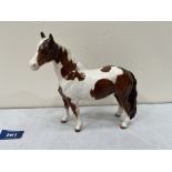 A Beswick white and brown gloss glaze horse. 6½' high