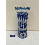 An overlaid cut blue glass vase. 8' high