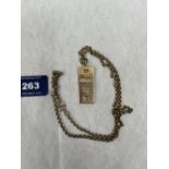 A 9ct ingot pendant and chain. 26g