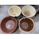 Four earthenware pancheons