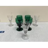 Four 19th century Bristol green goblets together with three early 19th century cut glass cordial