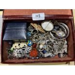 A box of costume and silver jewellery