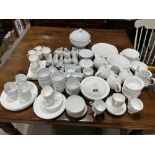 An extensive collection of white glazed dinner and teaware, various factories and designs