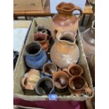 A collection of glazed and unglazed pottery
