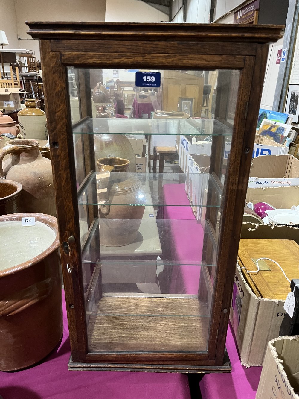 An oak shop display case. 27' high