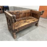 Colonial Furniture. An Indian hardwood and metal strap applied bench, the arm terminals with