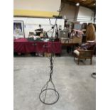 A contempory style floor standing candle holder. 75' high