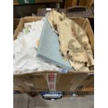 A box of table linen and other textiles