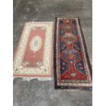 An eastern carpet runner 93' x 32' and a Chinese pink ground rug.