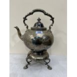 A Victorian plated kettle on spirit burner stand. 15½' high