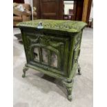 A French green enamel cast iron stove. 21'w x 22'h