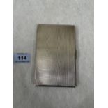 A George VI silver engine turned cigarette case. Birmingham 1947. 5' high. 6ozs 8dwts