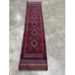 A Meshwani carpet runner. 2.5m x 0.61m