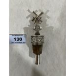 A Dutch silver wine bottle pourer, the cover in the form of a windmill. 4' high
