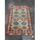 A Choli Kilim rug. 1.54m x 1.07m