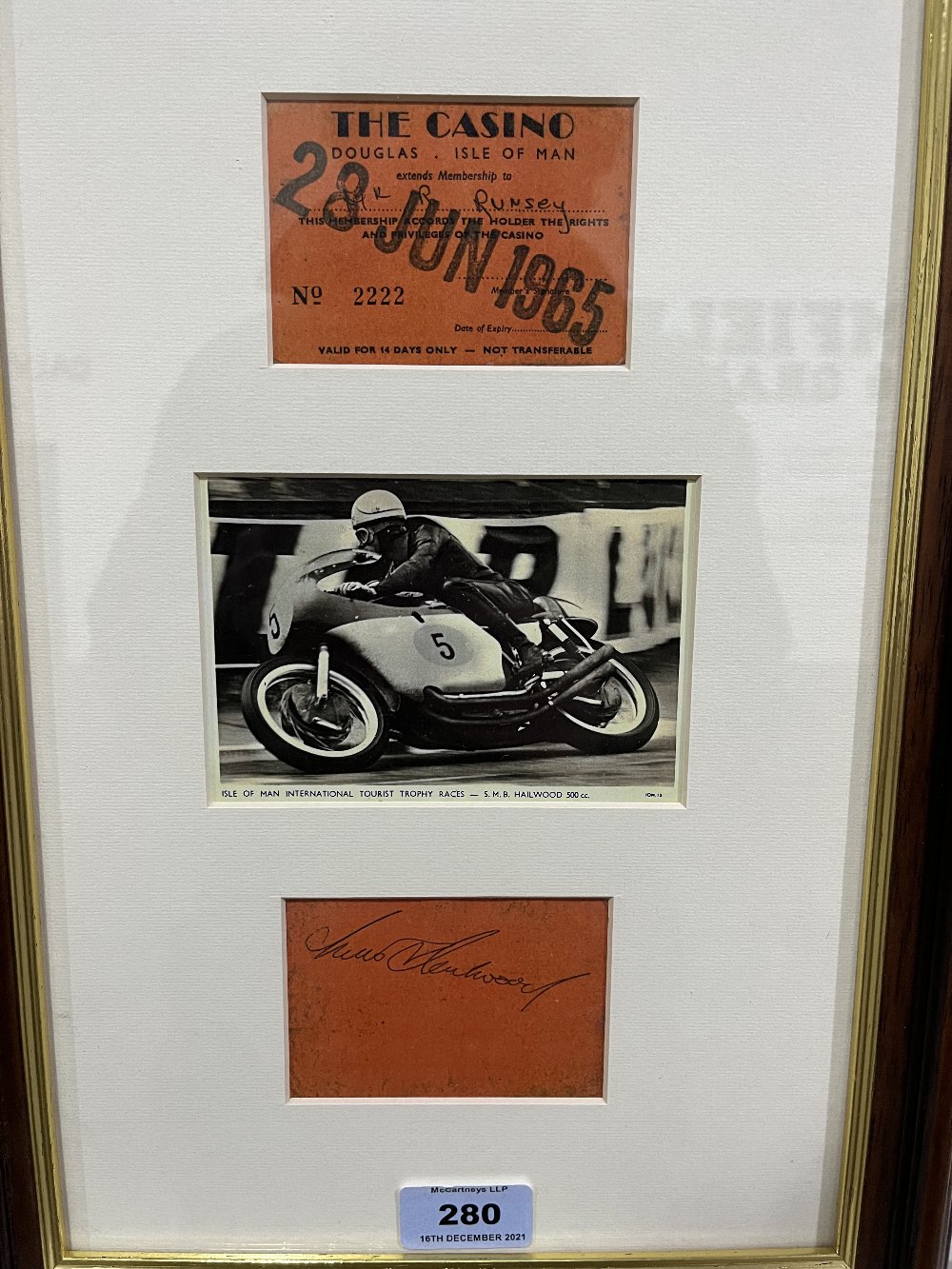 Mike Hailwood 1965 Isle of Man T.T. A framed ticket, autograph and photograph