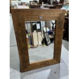 A reclaimed pine wall mirror. 32' x 43'