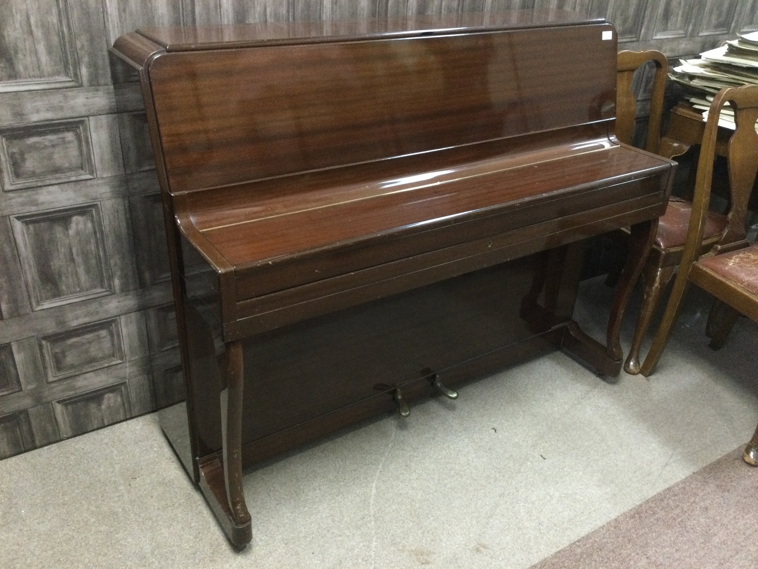 A MODERN UPRIGHT PIANO