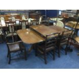 A REGENCY STYLE MAHOGANY DINING TABLE AND SIX CHAIRS