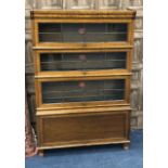 AN OAK SECTIONAL BOOKCASE