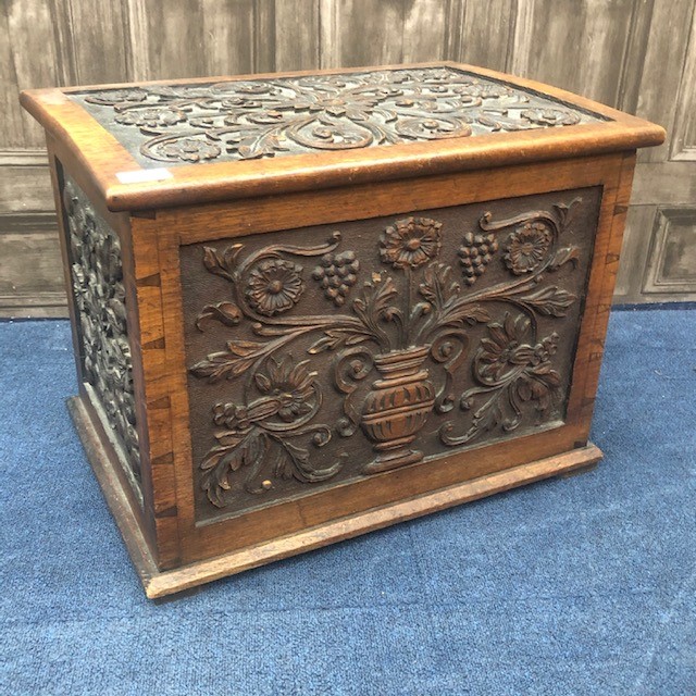 A 20TH CENTURY CARVED OAK LOG BOX