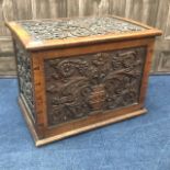 A 20TH CENTURY CARVED OAK LOG BOX