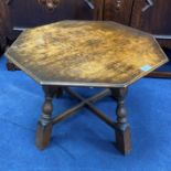 AN EDWARDIAN OAK OCATGONAL OCCASIONAL TABLE