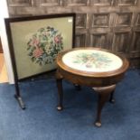 A MAHOGANY CIRCULAR OCCASIONAL TABLE AND A FIRESCREEN