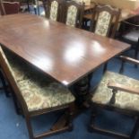 AN OAK SIDEBOARD, DINING TABLE AND SIX CHAIRS
