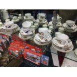 A ROYAL WORCESTER 'EVESHAM' PART TEA SERVICE AND ANOTHER