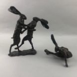 A BRONZE FIGURE GROUOP OF FIGHTING HARES AND ANOTHER OF A SEATED HARE