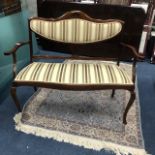 A MAHOGANY UPHOLSTERED PARLOUR SETTEE