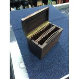 A 1920'S ROSEWOOD CIGARETTE BOX, TWO SILVER VESTA CASES AND OTHER ITEMS