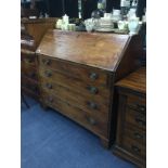 A LATE GEORGIAN MAHOGANY BUREAU