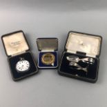 A SILVER POCKET WATCH ALONG WITH A PUSHER SET AND A MEDAL