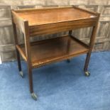 A MAHOGANY TWO TIER TROLLEY AND A MODERN COFFEE TABLE