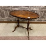 A MAHOGANY OVAL OCCASIONAL TABLE