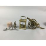 A BRASS CARRIAGE CLOCK ALONG WITH OTHER BRASS ITEMS