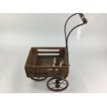 AN EARLY 20TH CENTURY TRI-ANG MODEL DAIRY CART