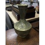 AN EASTERN BRASS VASE ALONG WITH OTHER COLLECTABLES