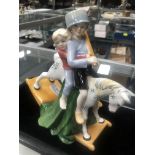 A ROYAL DOULTON FIGURE OF 'HOLD TIGHT' AND OTHER FIGURES
