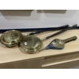 A PAIR OF VINTAGE BELLOWS, TWO BRASS BED PANS AND A BRASS CHARGER