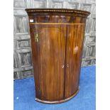 A GEORGE III MAHOGANY BOX FRONTED WALL MOUNTED CORNER CUPBOARD