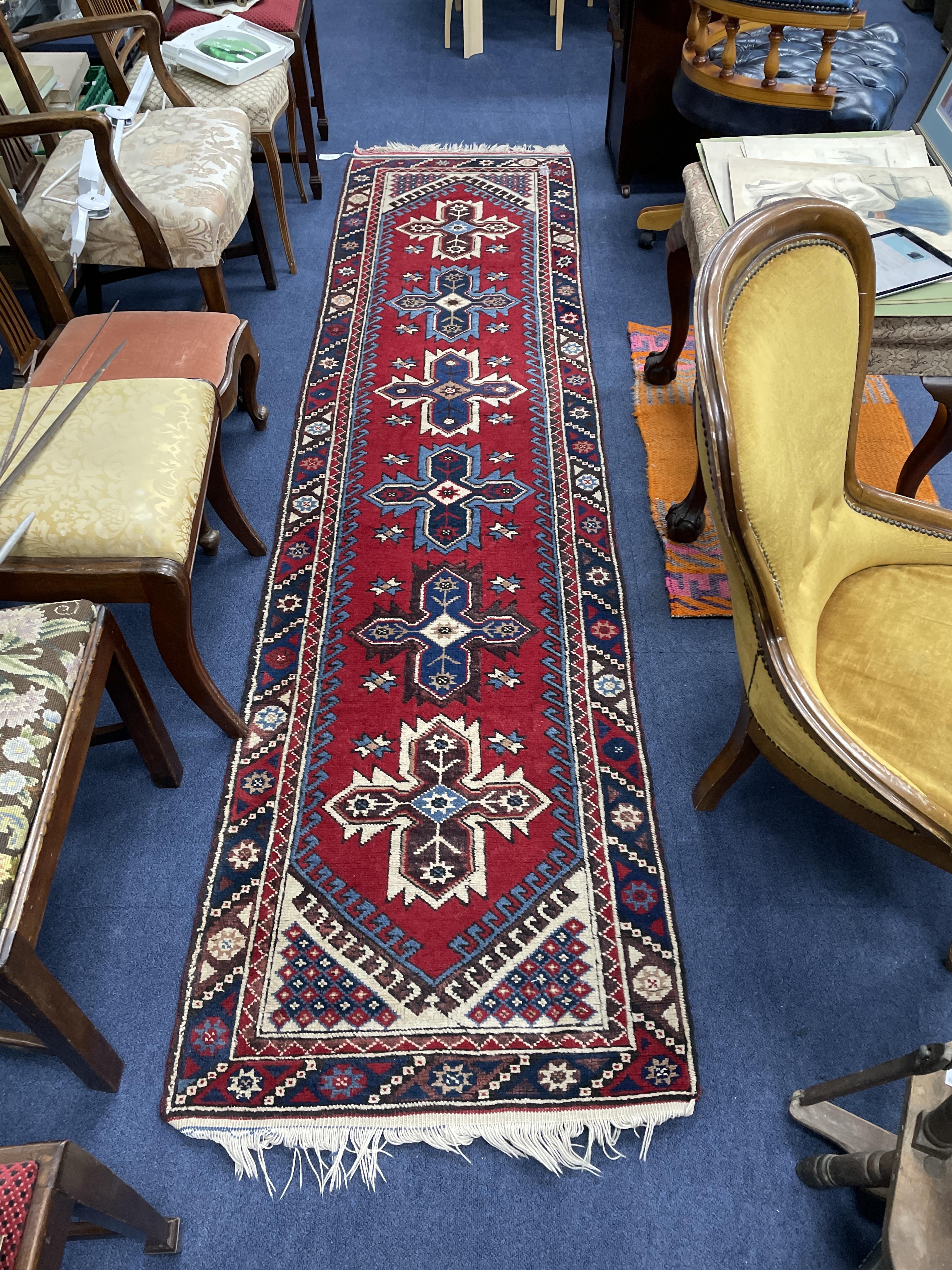 A MIDDLE EASTERN FRINGED AND BORDERED RUNNER AND A RUG - Image 3 of 4