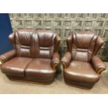 A THREE PIECE BROWN LEATHER SUITE