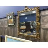 A BRASS FRAMED WALL MIRROR AND ANOTHER