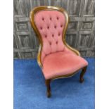 A MAHOGANY BUTTON BACK NURSING CHAIR